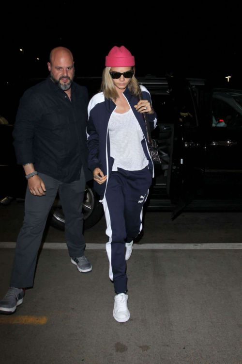 Cara Delevingne arriving at LAX Airport in Los Angeles