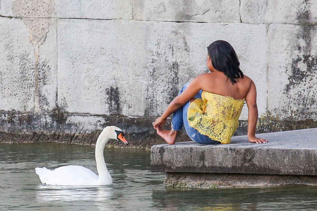 Christina Milian comes head to head with a swan in Zurich 1