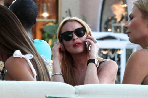 Lindsay Lohan Shopping at Fine Swiss Jewellers Chopard in Porto Cervo