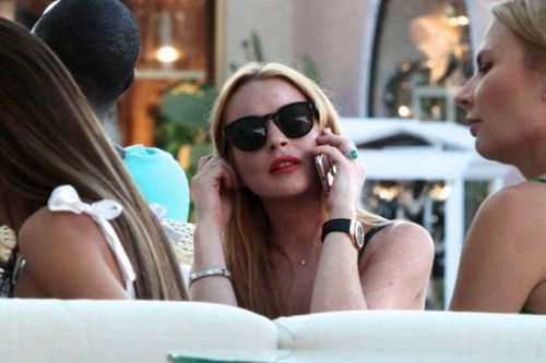 Lindsay Lohan Shopping at Fine Swiss Jewellers Chopard in Porto Cervo 4