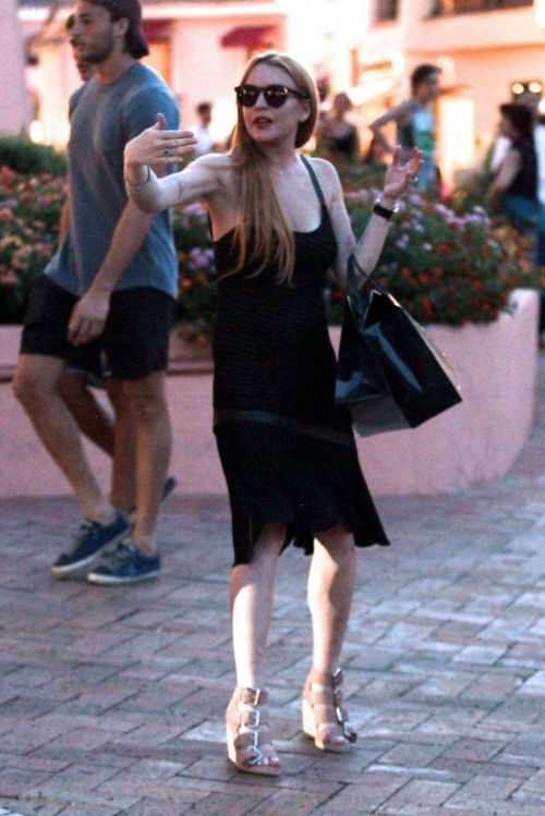 Lindsay Lohan Shopping at Fine Swiss Jewellers Chopard in Porto Cervo 5