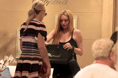 Lindsay Lohan Shopping at Fine Swiss Jewellers Chopard in Porto Cervo 9
