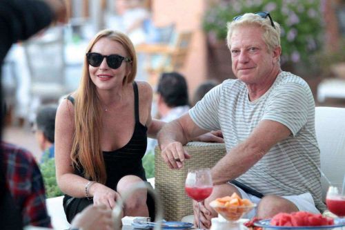 Lindsay Lohan Shopping at Fine Swiss Jewellers Chopard in Porto Cervo 13