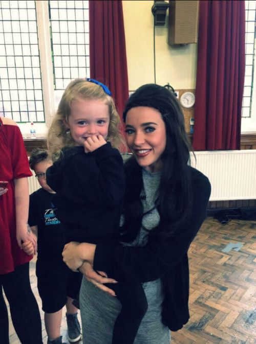 Stephanie Davis shows off her baby bump on a school 6