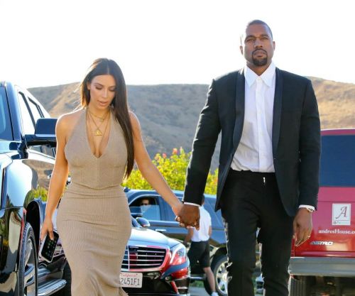 Kim Kardashian and Kanye West At Wedding Of Their Friends In Simi Valley