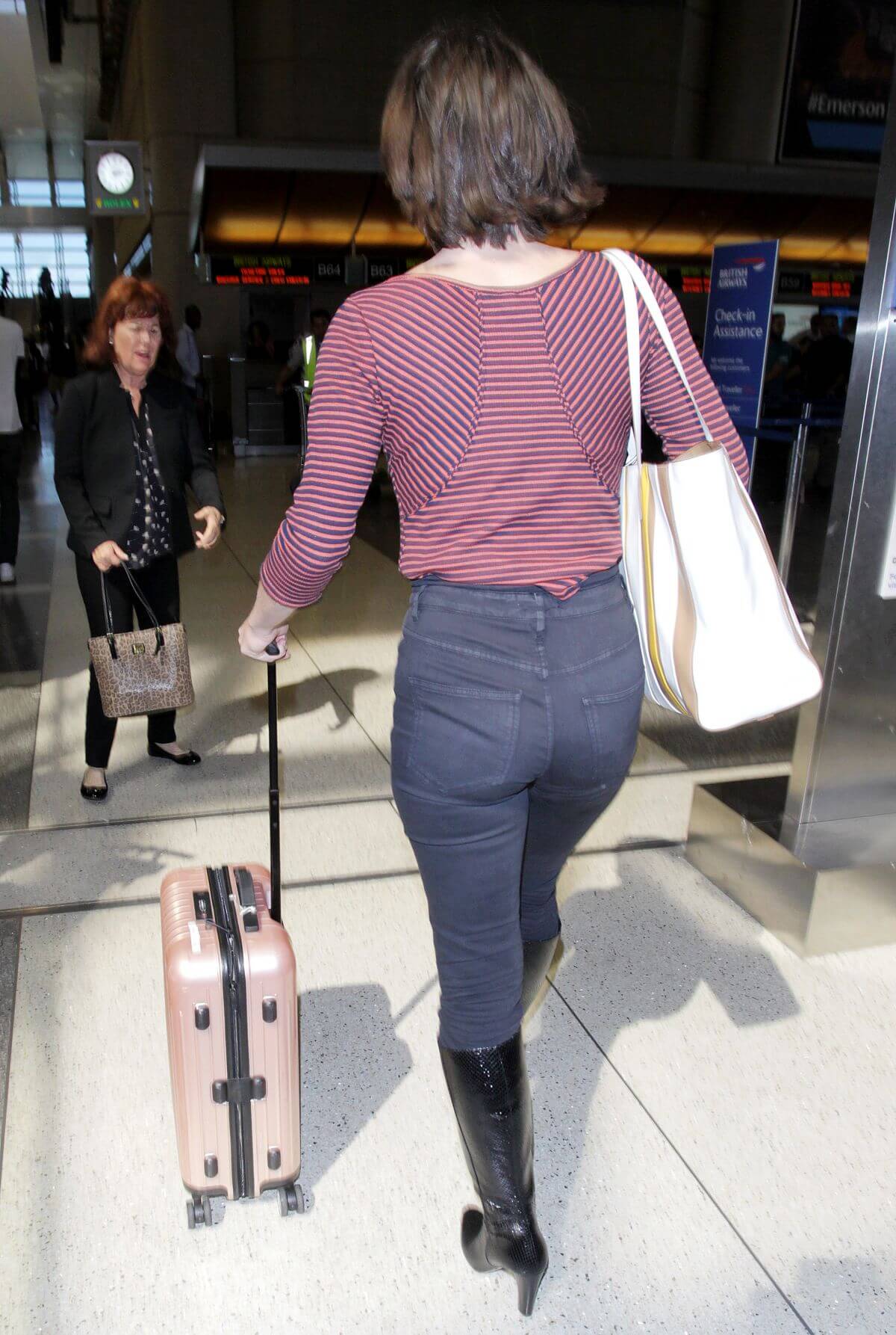 Milla Jovovich Stills at Los Angeles International Airport 1
