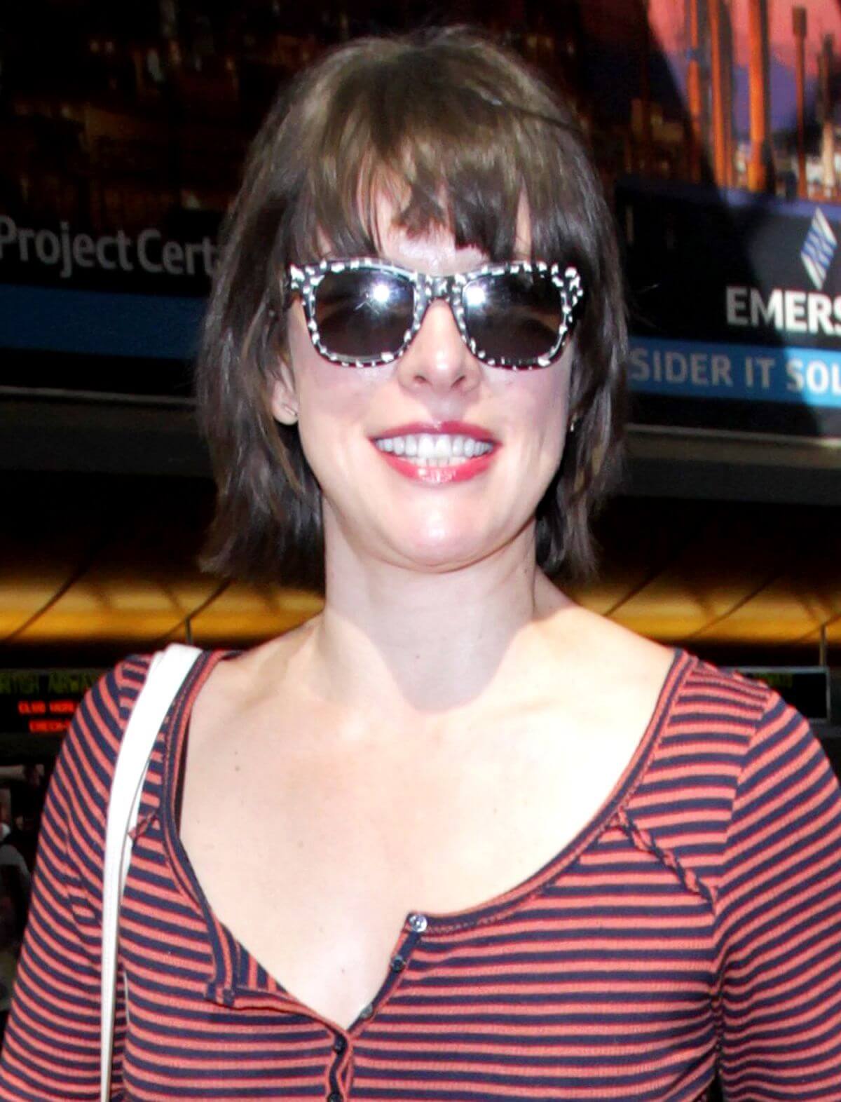Milla Jovovich Stills at Los Angeles International Airport 11