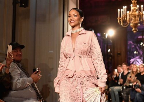 Rihanna Stills takes her place at her Fenty x Puma catwalk show at Paris Fashion Week
