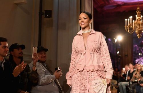 Rihanna Stills takes her place at her Fenty x Puma catwalk show at Paris Fashion Week 2