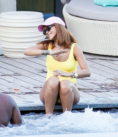 Rihanna in Swimsuit at Pool at her Hotel in Zurich 18