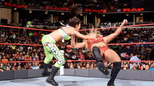 WWE Raw : Sasha Banks & Becky Lynch def. WWE Women Champion Charlotte & Dana Brooke 22