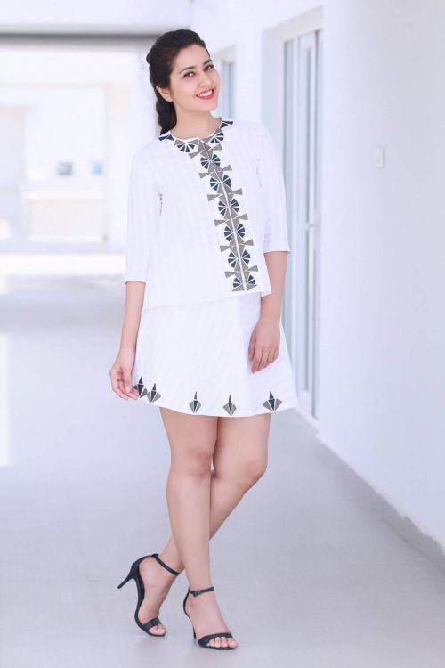 Rashi Khanna Hot Photoshoot in White Mini Skirt Pics 1