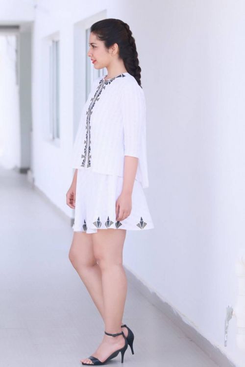 Rashi Khanna Hot Photoshoot in White Mini Skirt Pics 3