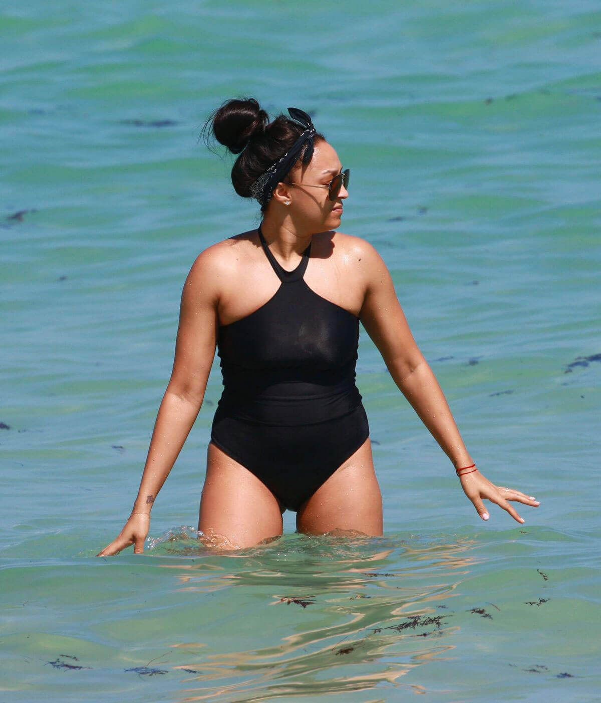 Tia Mowry Stills in Swimsuit at a Beach in Miami
