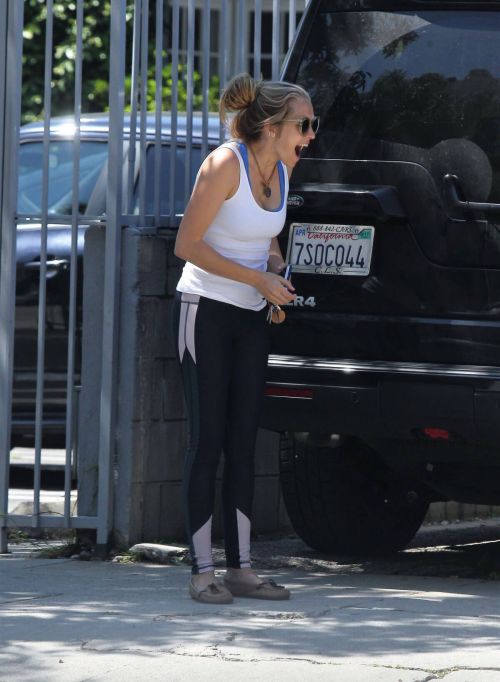 Teresa Palmer wearing in Tights Top & blue Jeans in Los Angeles 11