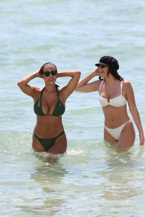 Devin Brugman and Natasha Oakley Stills in Biknis on the Beach in Miami 1