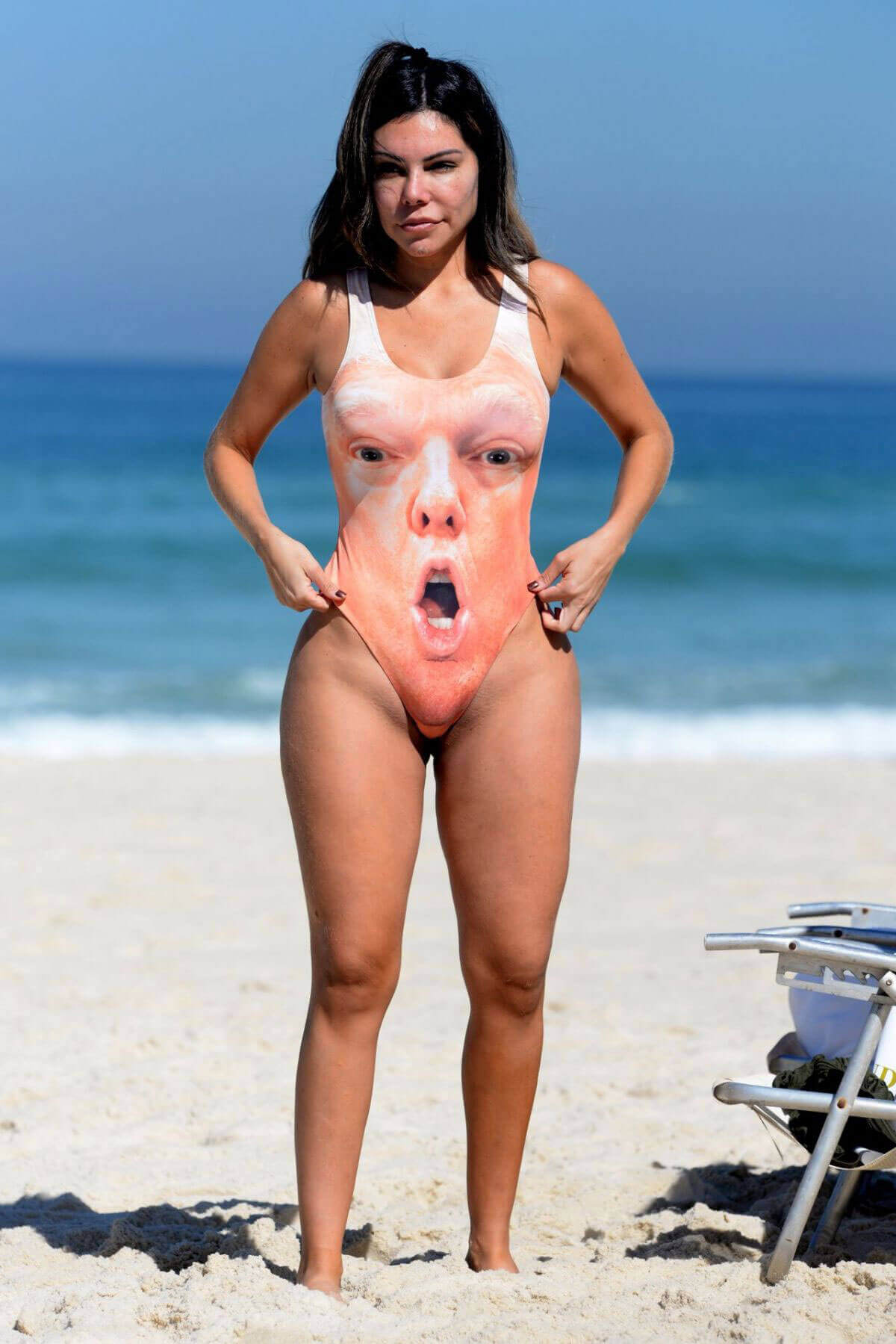 Liziane Gutierrez in Shocked Trump Swimsuit at a Beach in Brazil Photos
