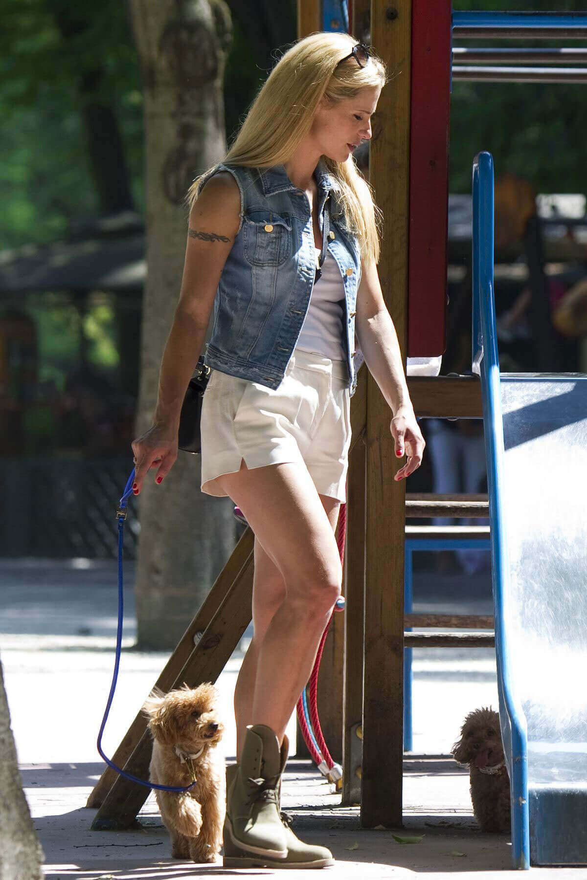 Michelle Hunziker at a Park in Milan Photos