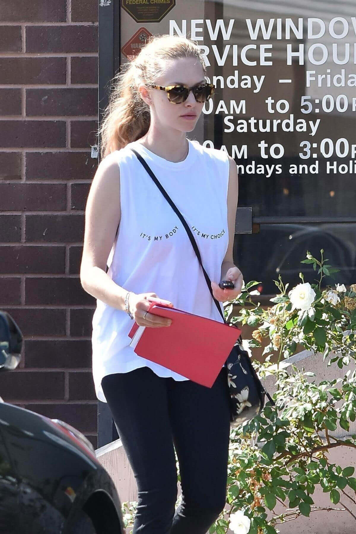 Amanda Seyfried wears "Its My Body, Its My Choice" Top Out and About in West Hollywood
