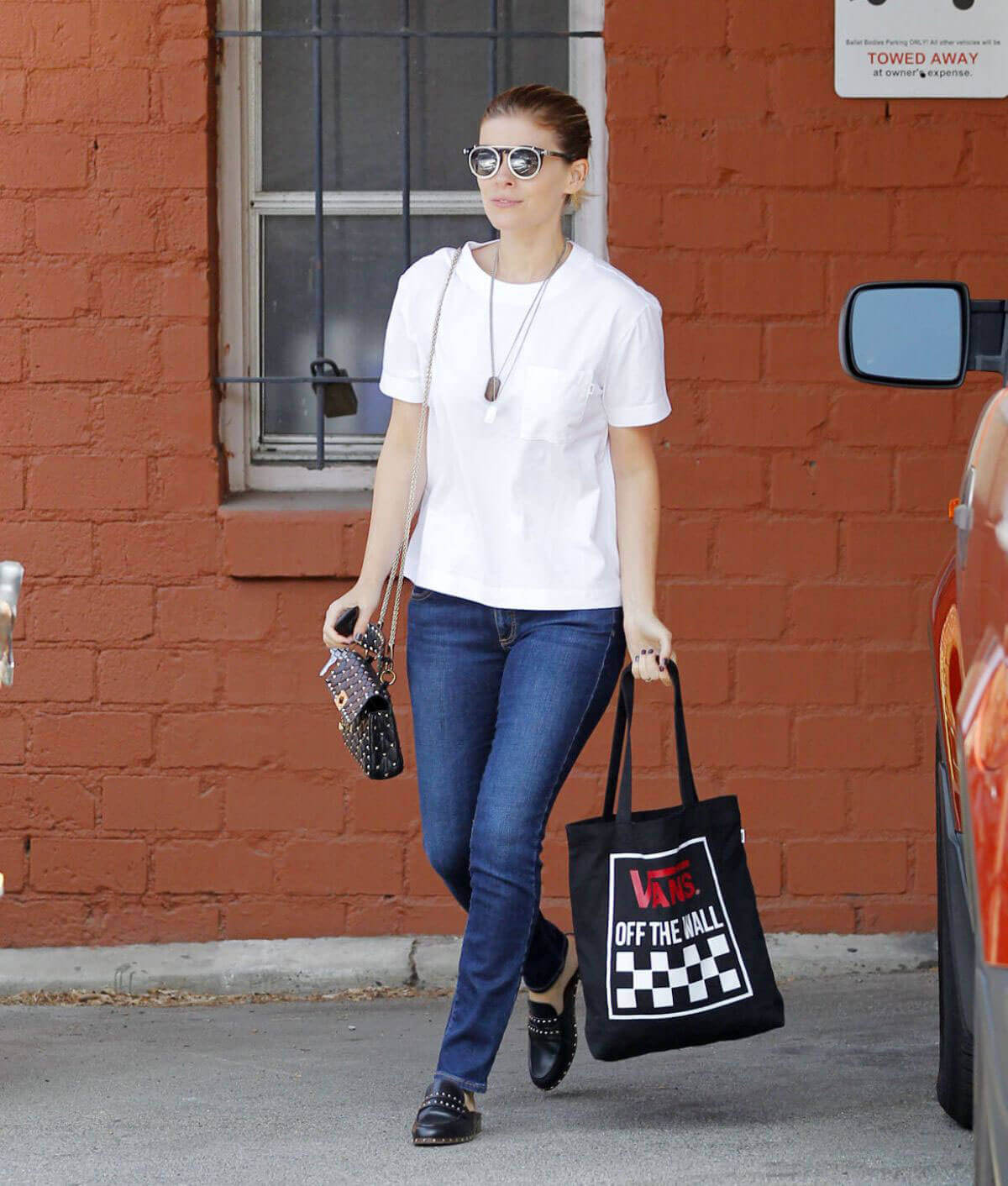 Kate Mara wears white top and blue jeans Out and About in Los Angeles