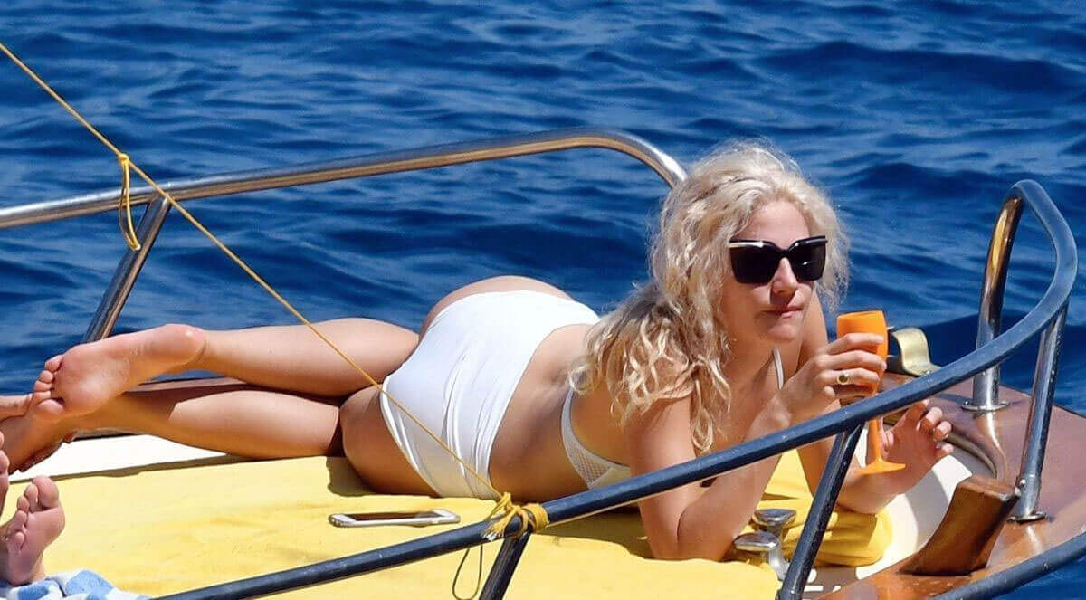 Pixie Lott wears white Bikini with her boyfriend at a Boat in Italy