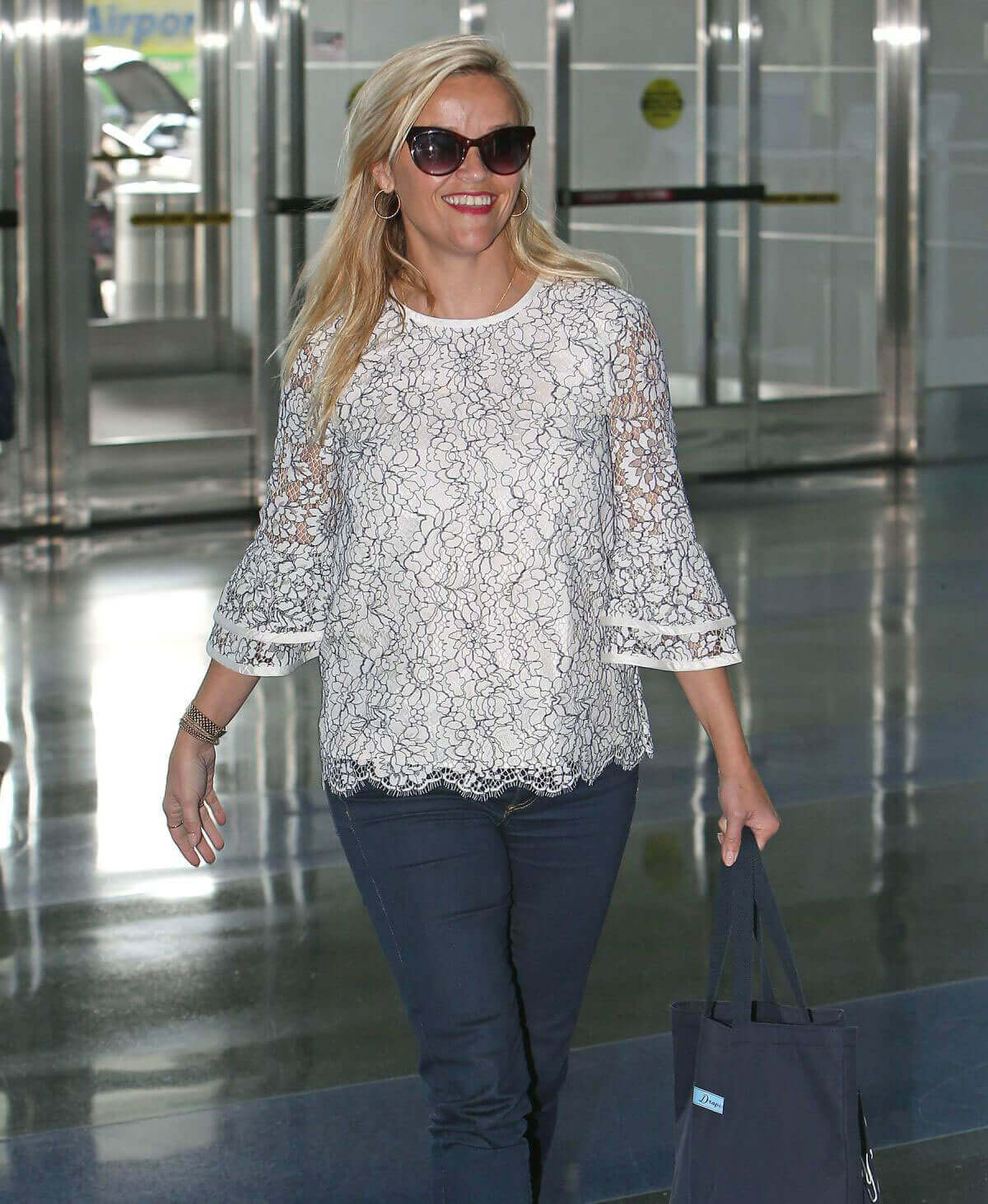 Reese Witherspoon Stills at JFK Airport in New York Photos