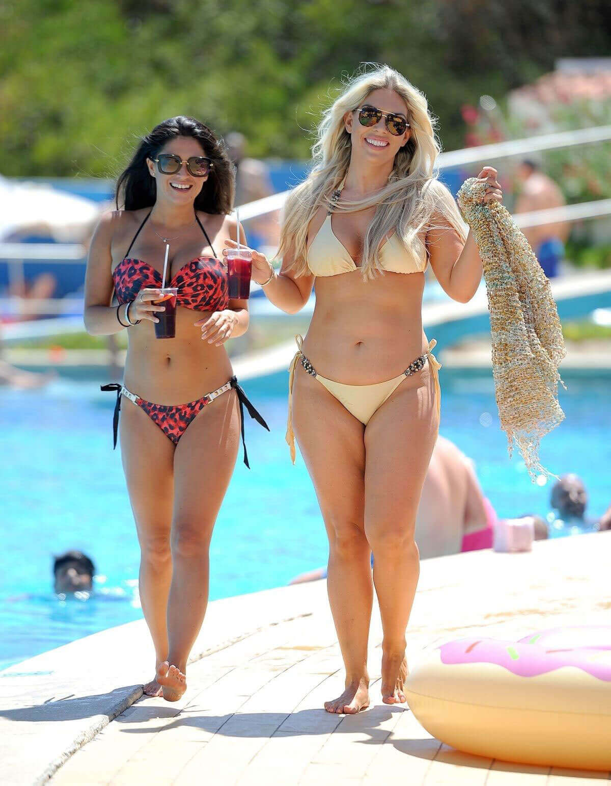 Casey Batchelor and Franke Essex Stills in Bikinis at a Pool in Spain