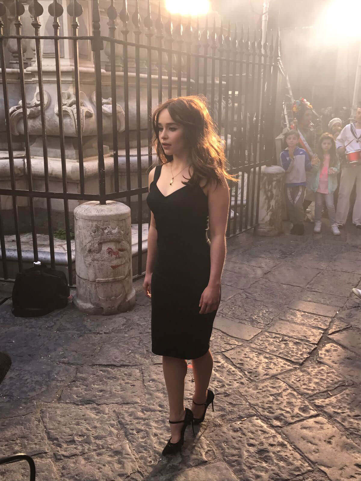 Emilia Clarke Stills Filming on the Streets of Naples