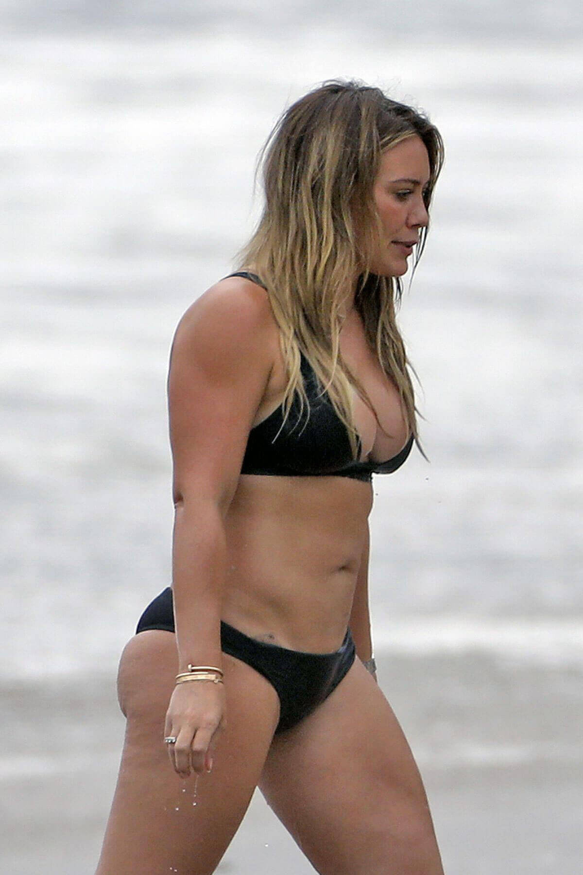 Hilary Duff wears tiny black bikini at a beach in Malibu