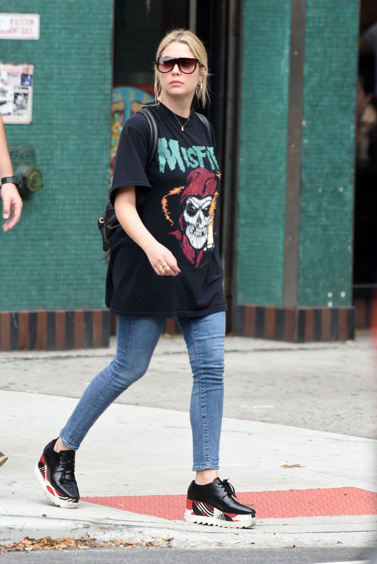 Ashley Benson wears Long T-Shirts and Tight Jeans Out and About in New York