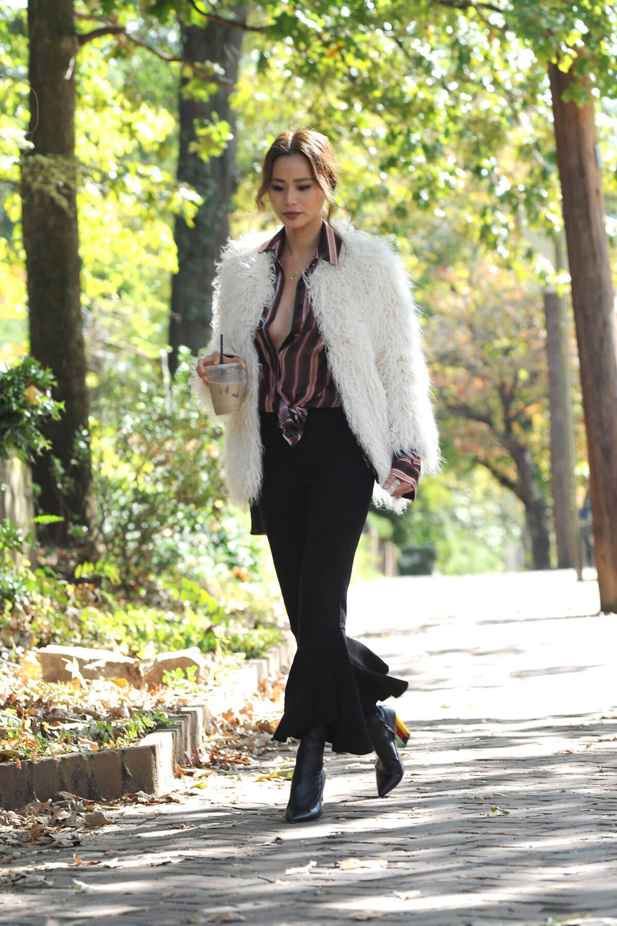 Jamie Chung wears Lining Shirt and Black Pants Out in Atlanta