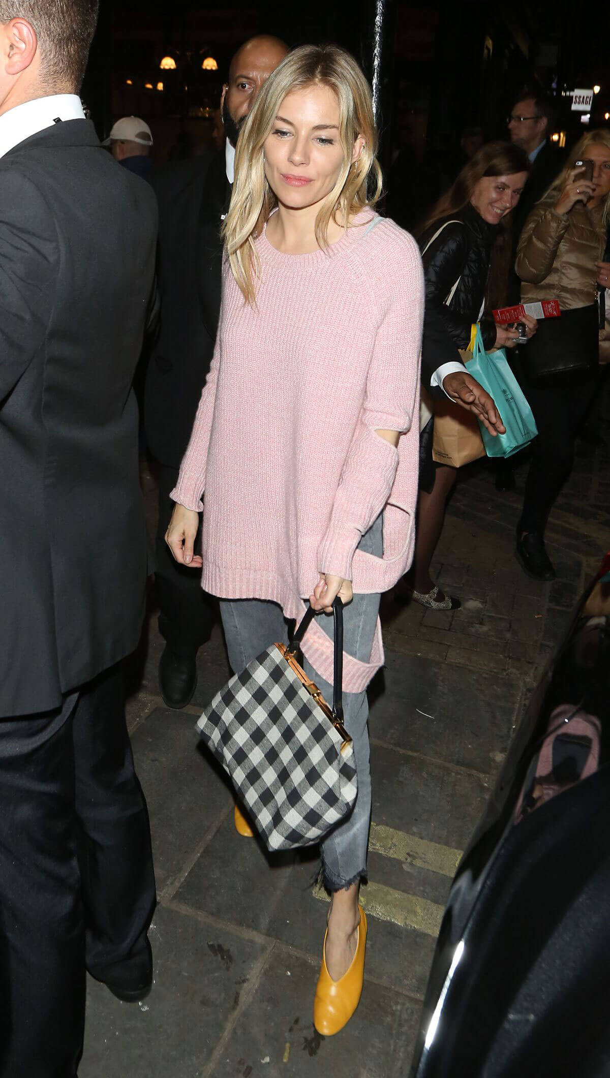 Sienna Miller wears Stylish Pink Sweatshirt Out and About in London