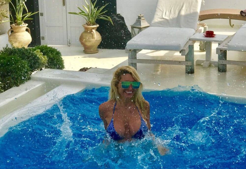 Victoria Xipolitakis Stills in Bikini at a Pool in Santorini