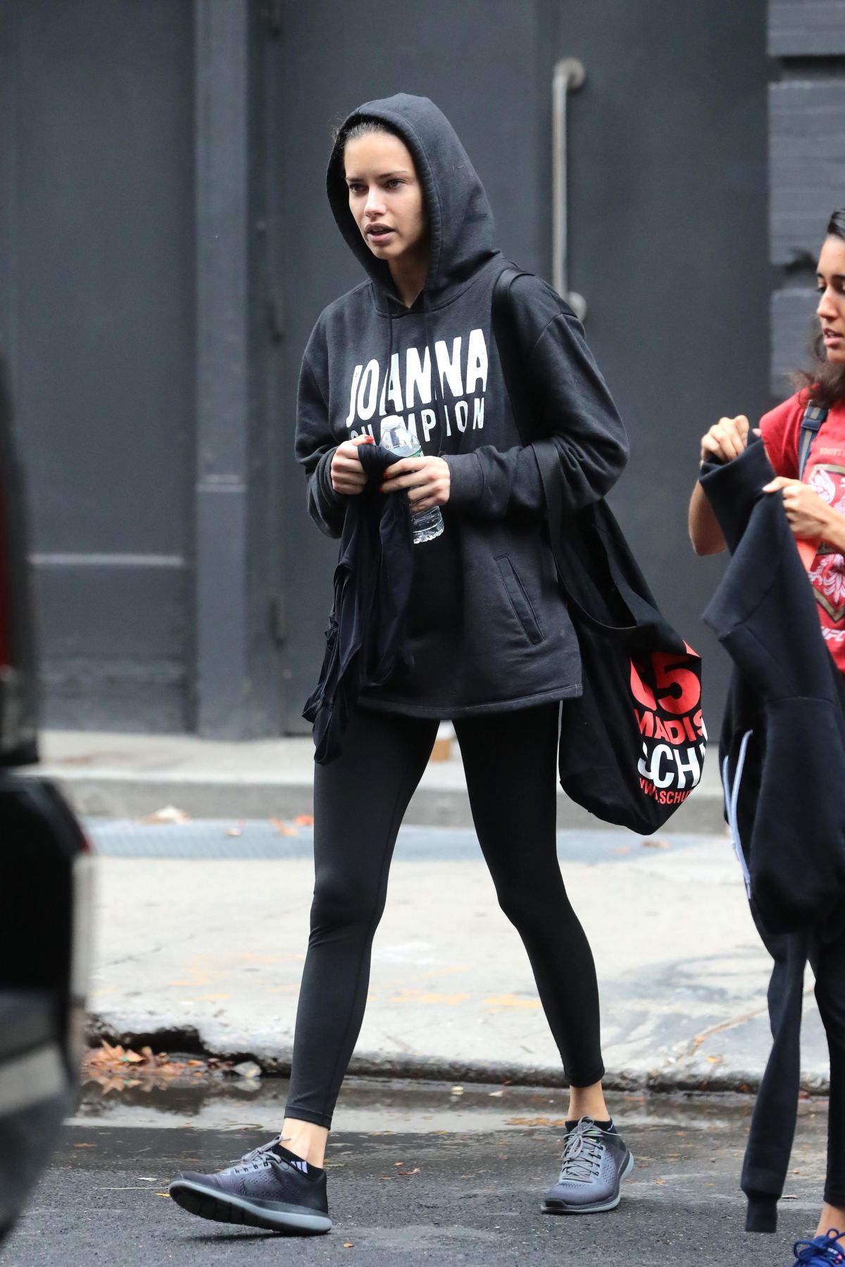 Adriana Lima wears Black Hoodie & Tights Bottom Leaves a Gym in New York