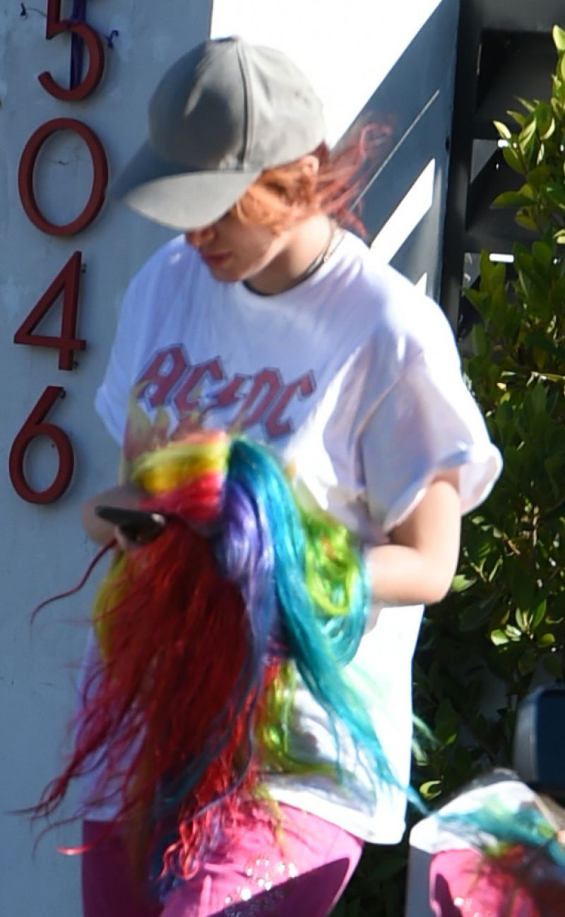 Bella Thorne wears White Tee & Purple Lower Heading to a Studio in Los Angeles