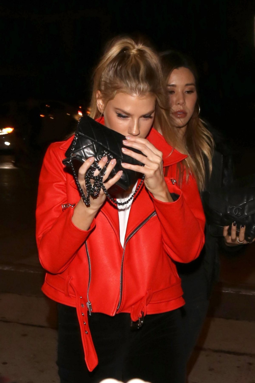 Charlotte McKinney wears Red Leather Jacket and White Tee Leaves Craig