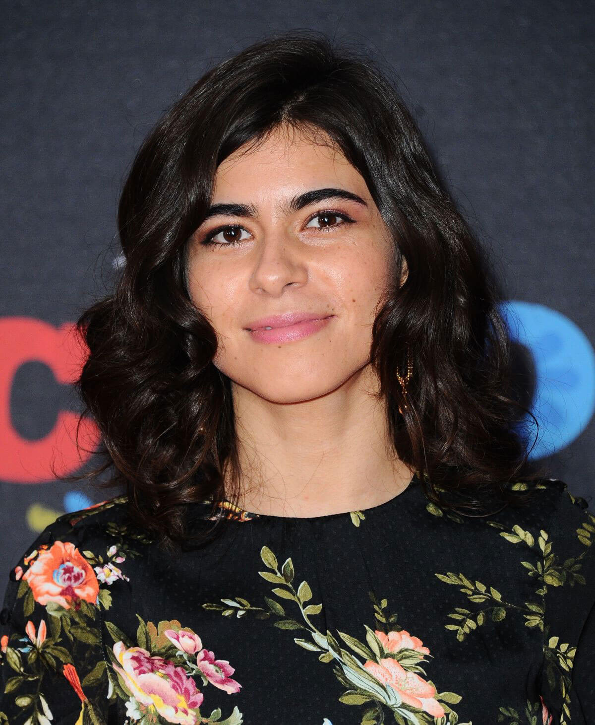 Sofia Espinosa wears Flower Dress at Coco Premiere in Los Angeles