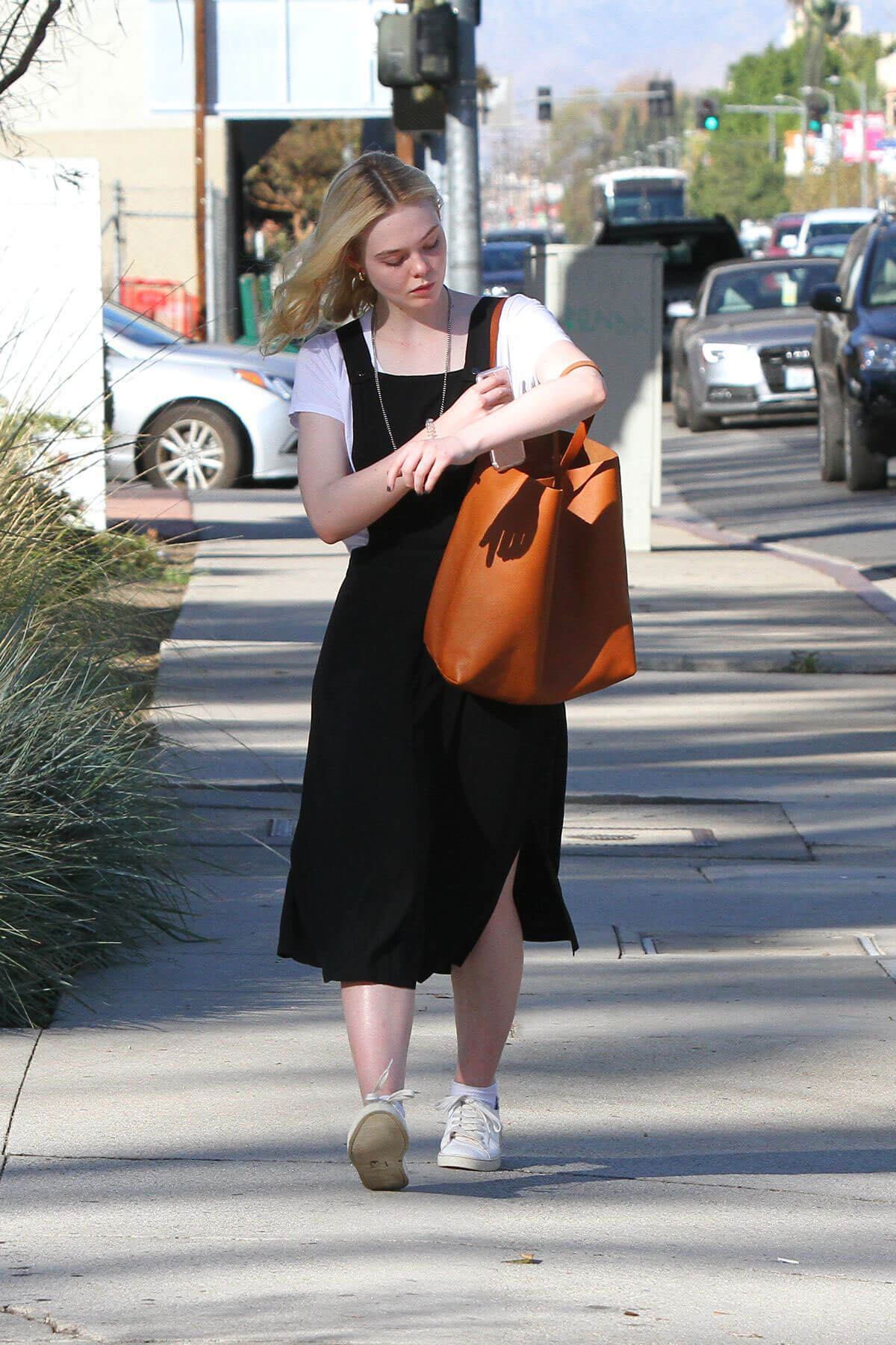 Elle Fanning in Black Long Frock Stills Out and About in Los Angeles