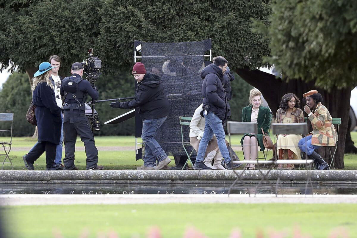 Lily James with Broken Toe Stills on the Set of 