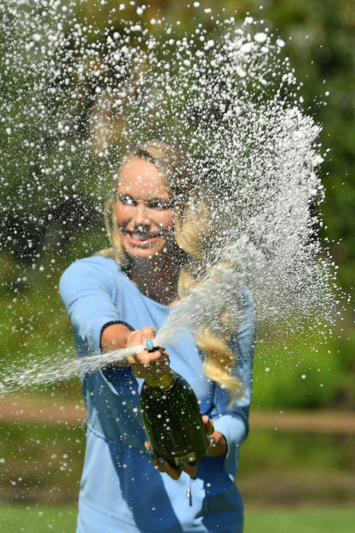 Caroline Wozniacki Stills Poses with Her Australian Open Trophy at Botanical Gardens in Melbourne 2018/01/28