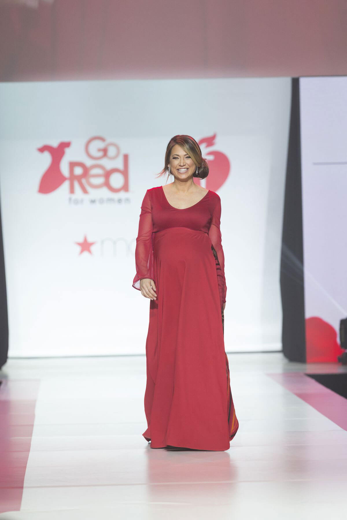 Pregnant Ginger Zee Stills in Gown by Galia Lahav at Red Dress 2018 Collection Fashion Show in New York 2018/02/08