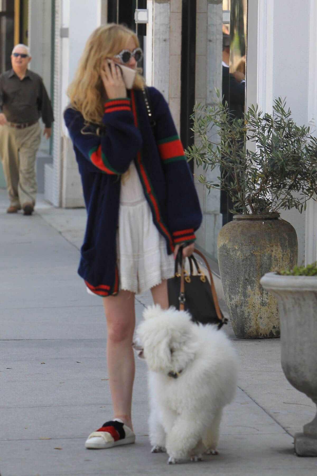 Kathryn Newton Out with Her Dog on Rodeo Drive in Beverly Hills 2018/06/20