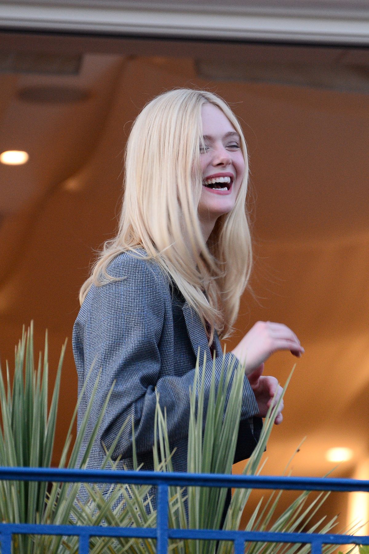Elle Fanning at balcony of the Martinez Hotel in the evening of the Cannes Film Festival in France 2019/05/13