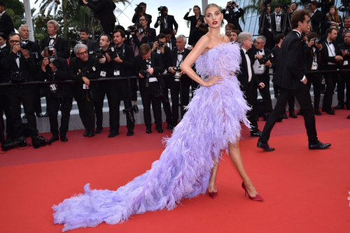 Elsa Hosk exudes the model glamour in plunging chiffon gown at the 