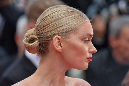 Elsa Hosk exudes the model glamour in plunging chiffon gown at the 