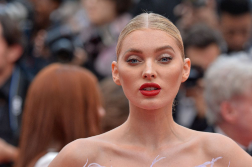 Elsa Hosk exudes the model glamour in plunging chiffon gown at the 