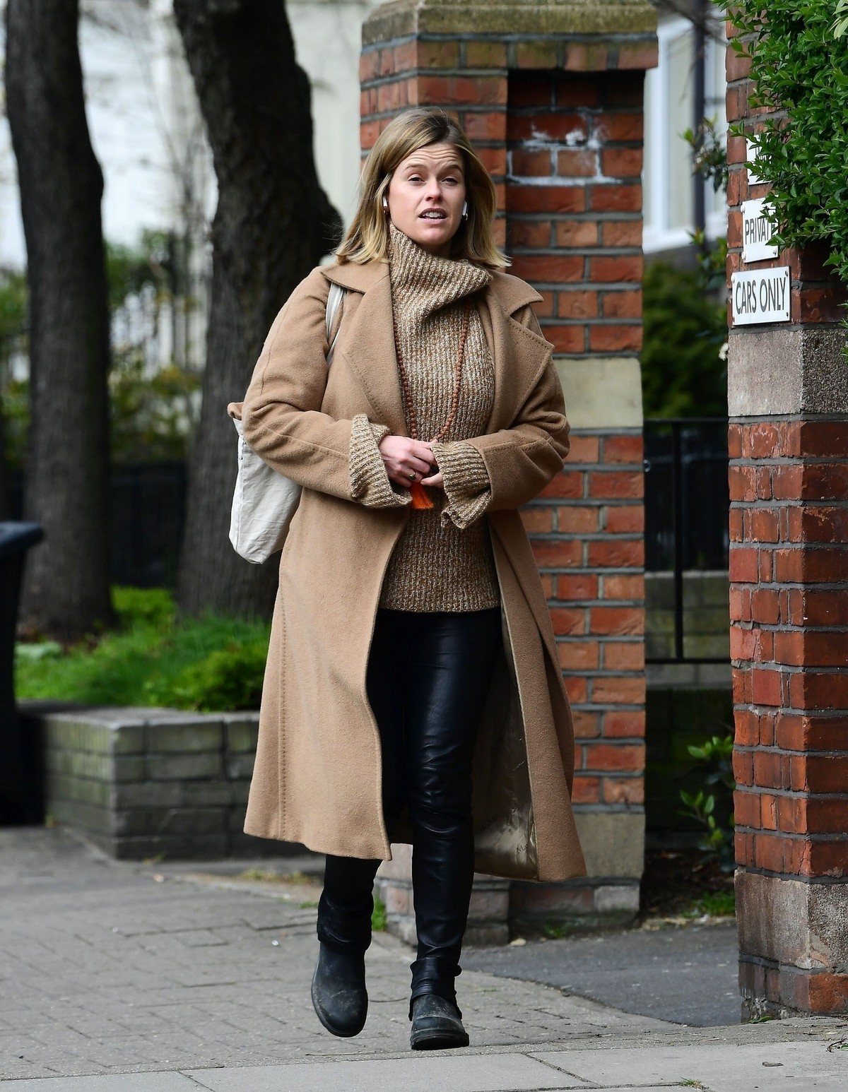 Alice Eve seen in brown long coat out and about in London 2020/04/06
