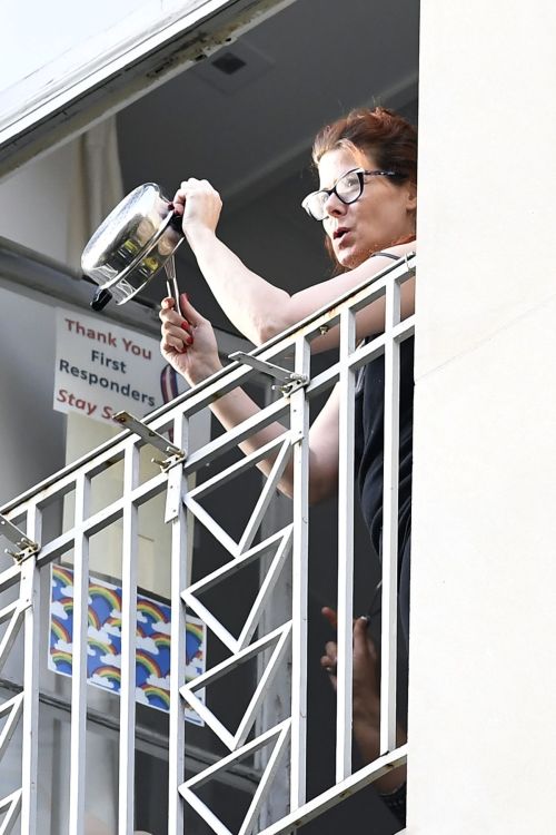 Debra Messing Cheering First Responders from Her Balcony in New York 2020/06/15