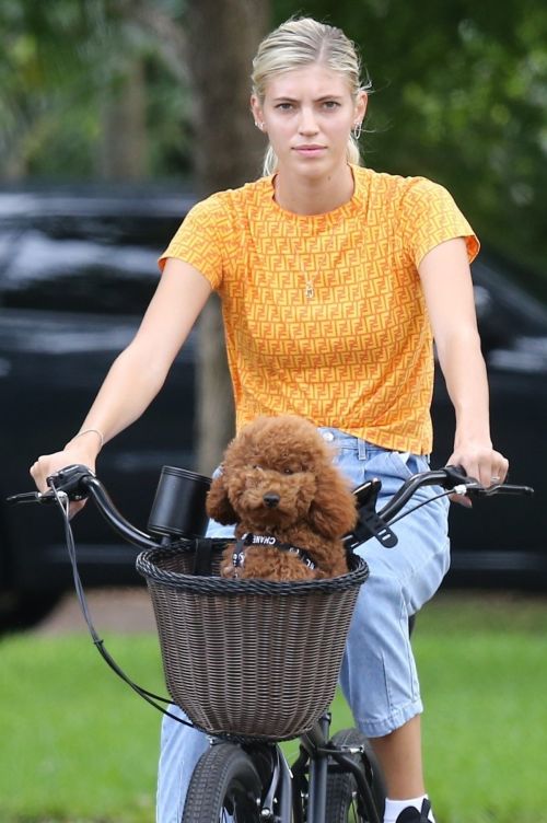 Devon Windsor Out Riding a Bike with Her Dog in Miami 2020/06/06 10