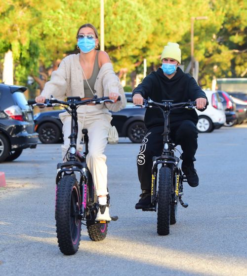 Hailey Bieber and Justin Bieber Out Riding Electric Bikes in Los Angeles 2020/06/14